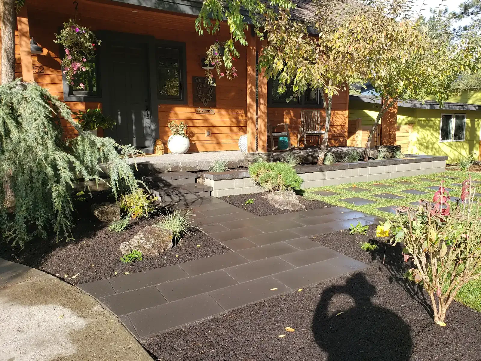 Finished paver walkway with plantings